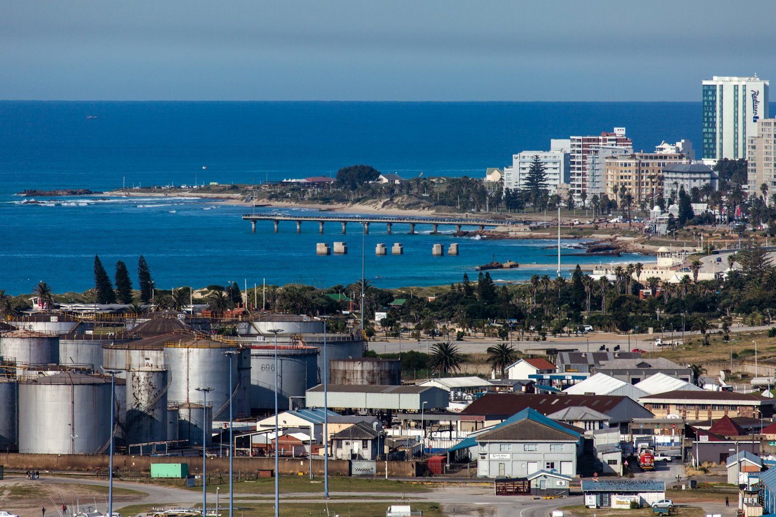 Industrial storage tanks on the coast at Gqeberha, South Africa