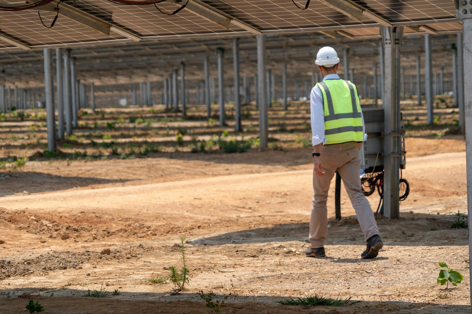Engineer inspecting a solar plant in Zambia